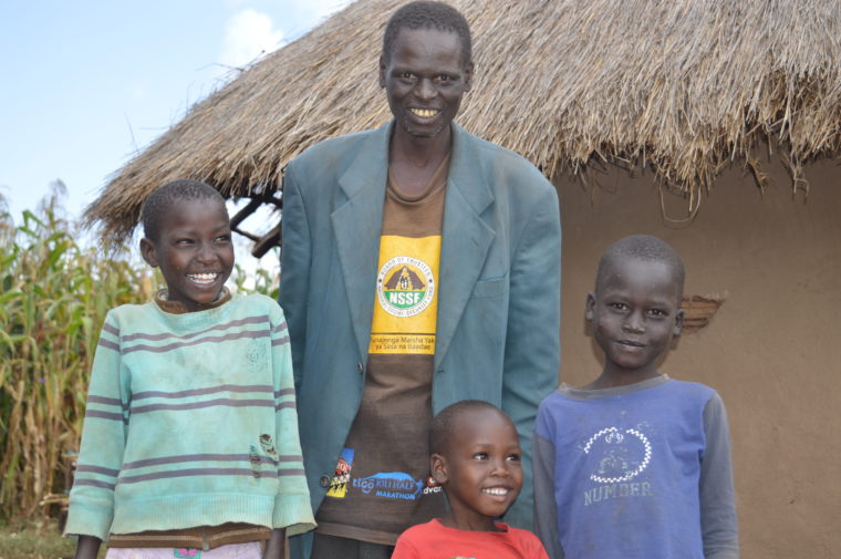 Kenyan man and his family