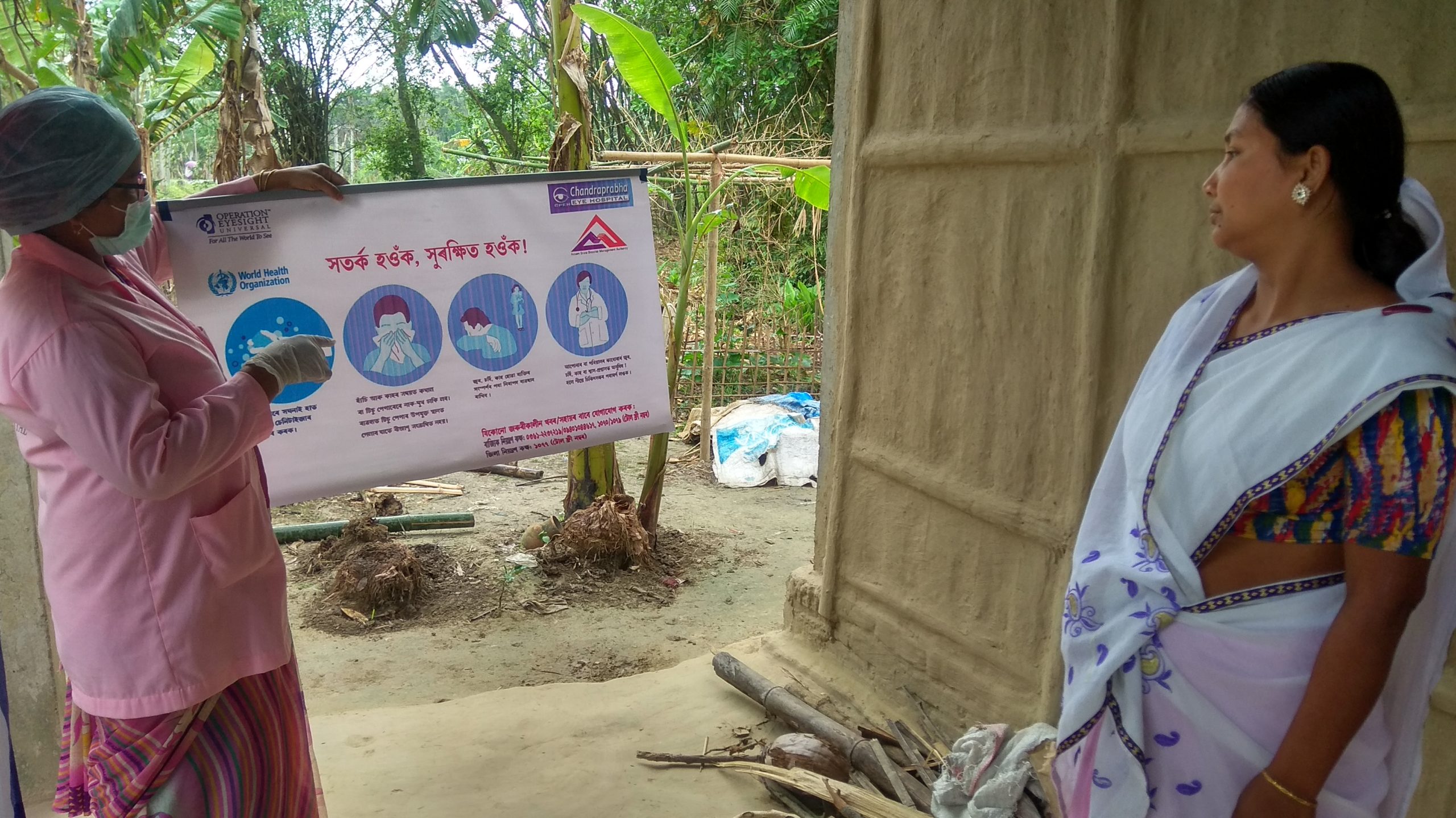 Woman instructing another woman on health education during COVID-19