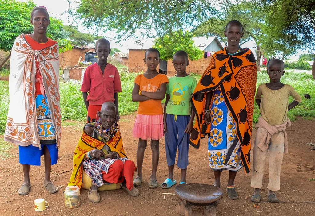 A Masaii family poses for a photo.